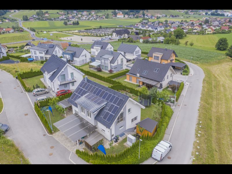 aerial view private houses with solar panels roofs 1